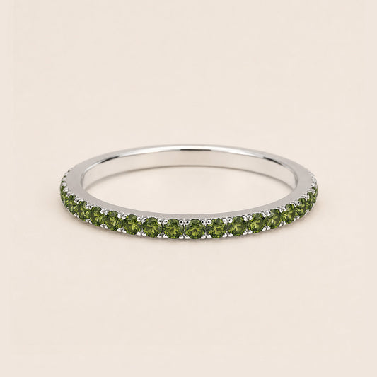 silver full pave CZ eternity ring dainty stackable band on cream background
