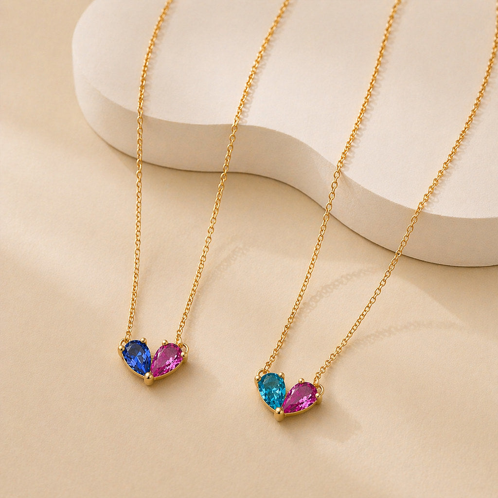 Close-up of heart birthstone pendant in 18K gold - Calioras