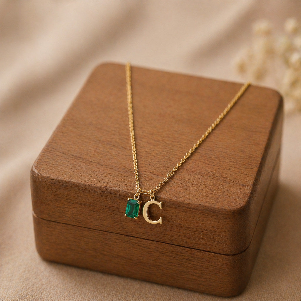 Close-up of rectangle pendant with birthstone and initial - Calioras
