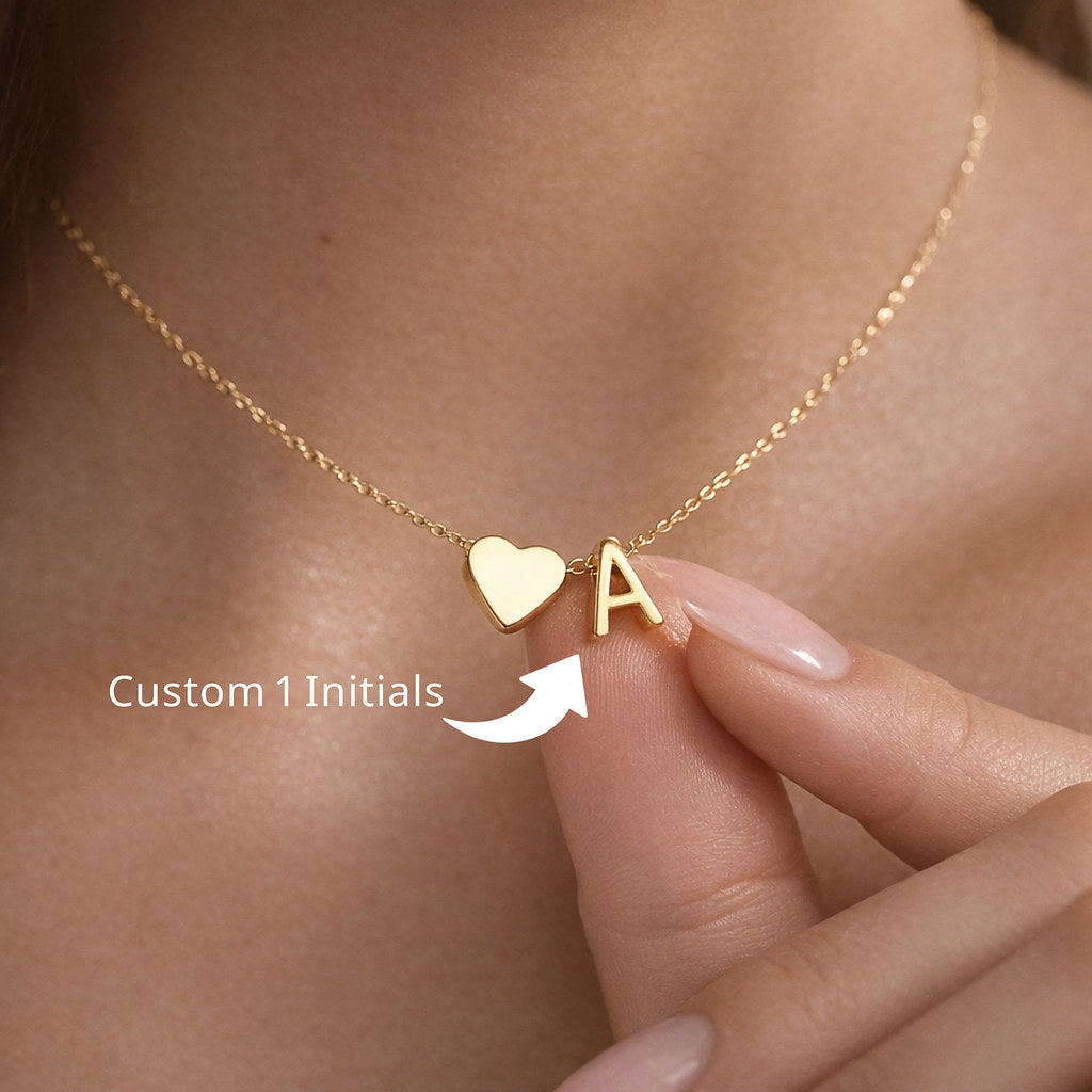 Close-up of dainty heart pendant with initial - Calioras
