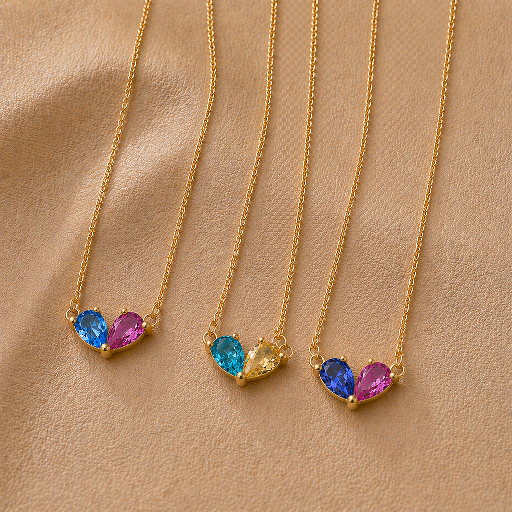 Close-up of heart birthstone pendant in 18K gold - Calioras