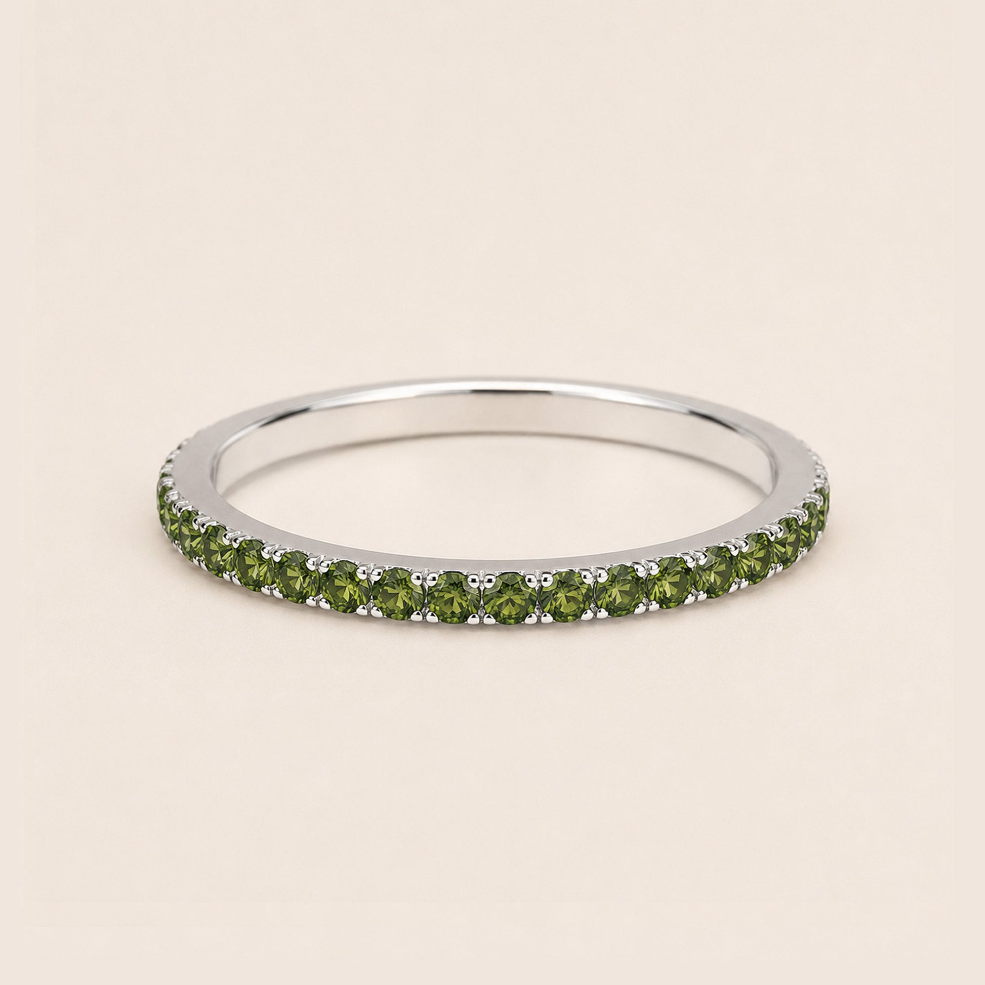 silver full pave CZ eternity ring dainty stackable band on cream background