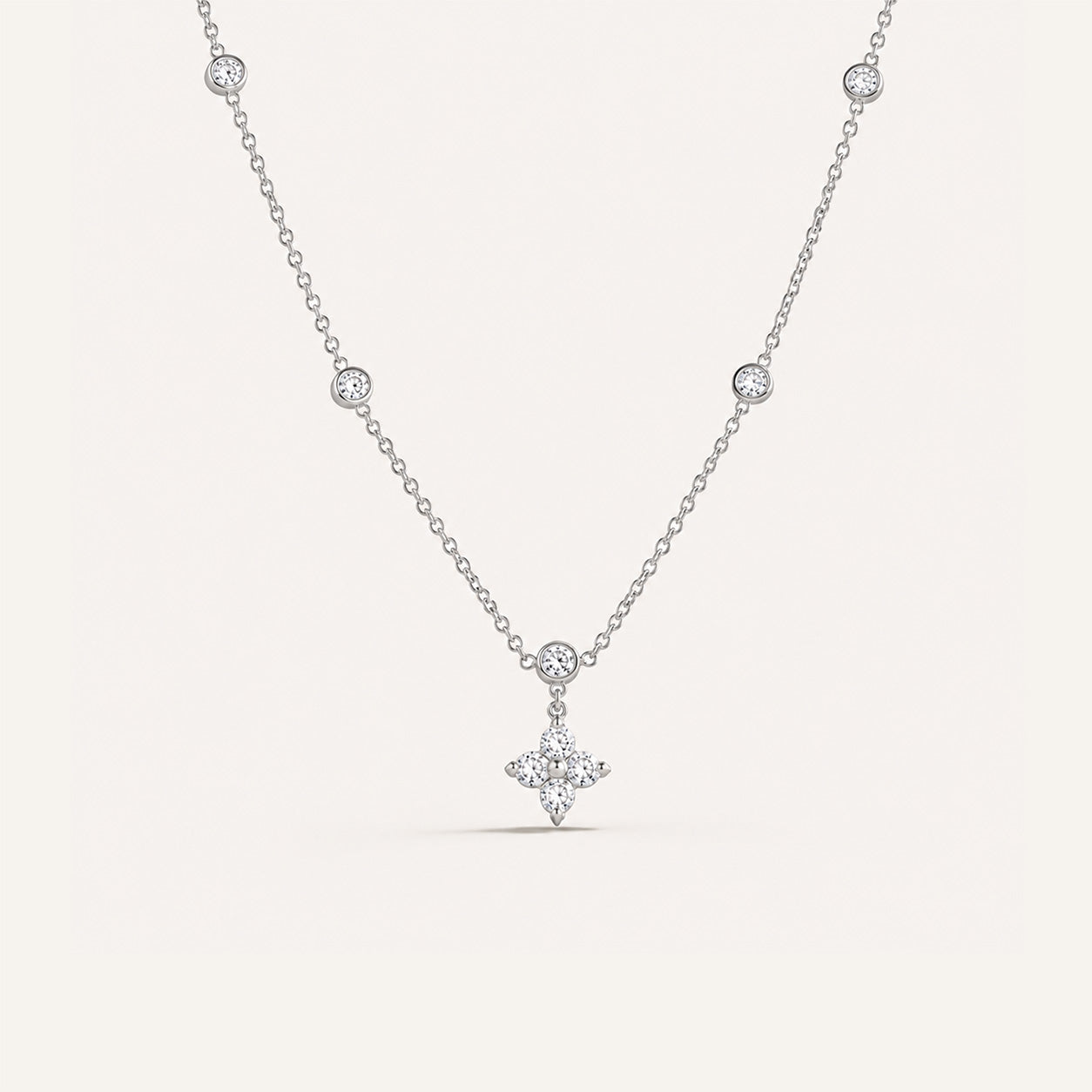 Crystal blossom station necklace in silver on cream background